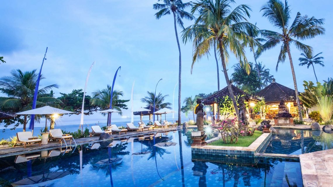 Puri Bagus Candidasa pool area in the evening