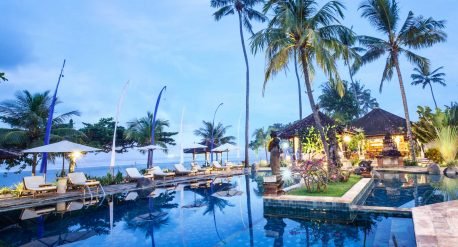 Puri Bagus Candidasa pool area in the evening