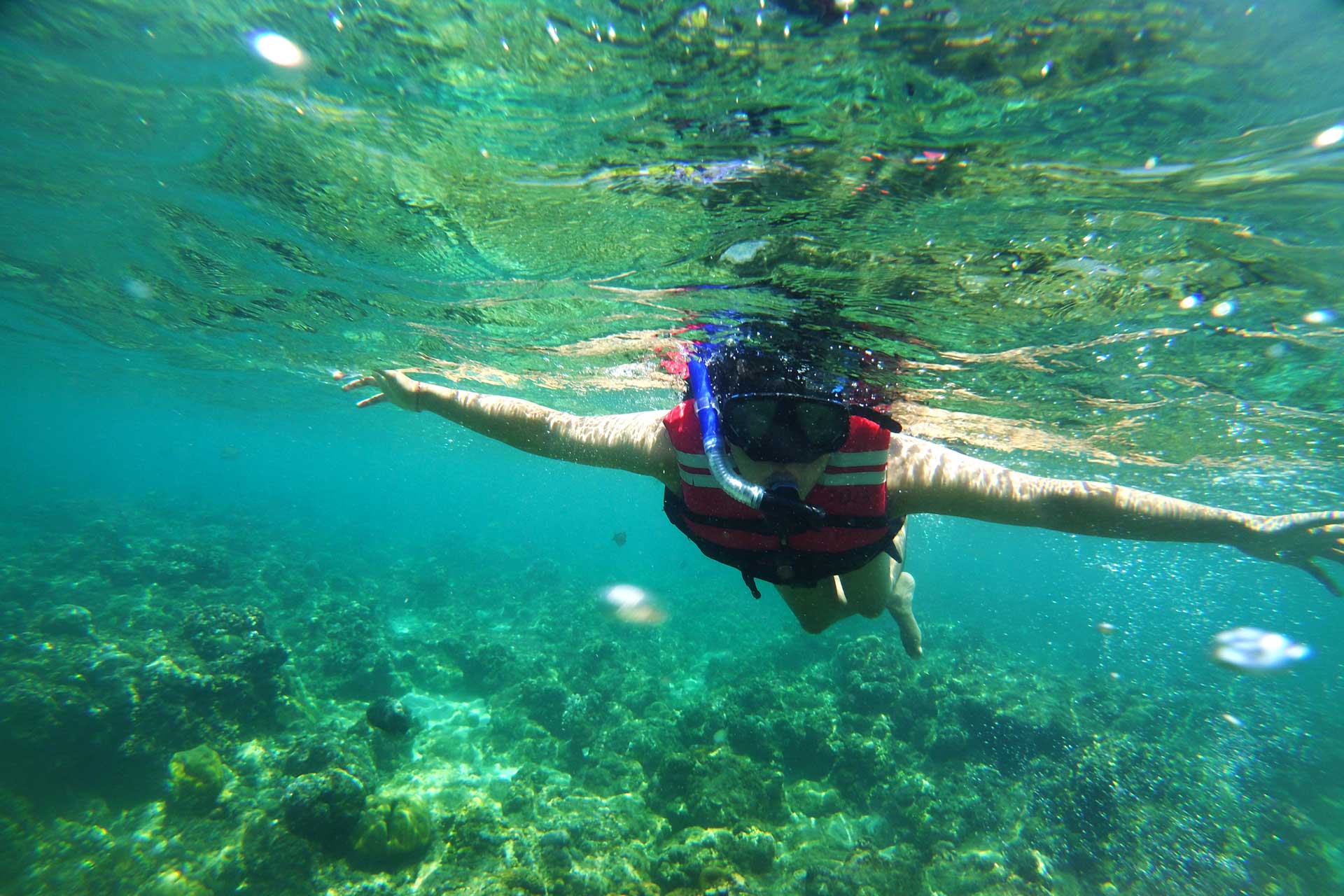 Man snorkeling in Candidasa's waters