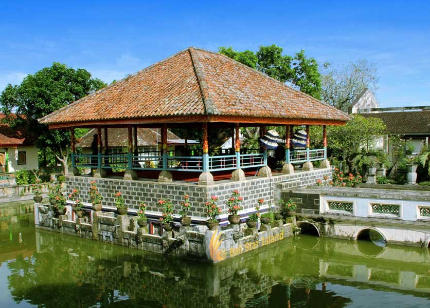 Main bale of Puri Karangasem surrounded by pond