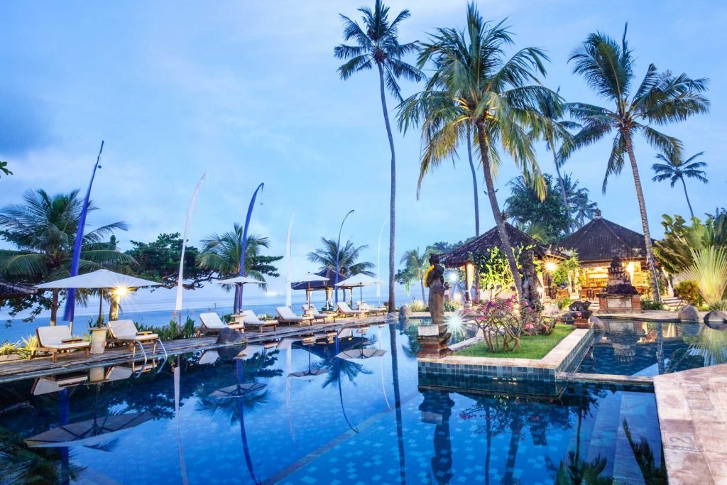 Puri Bagus Candidasa pool area in the evening